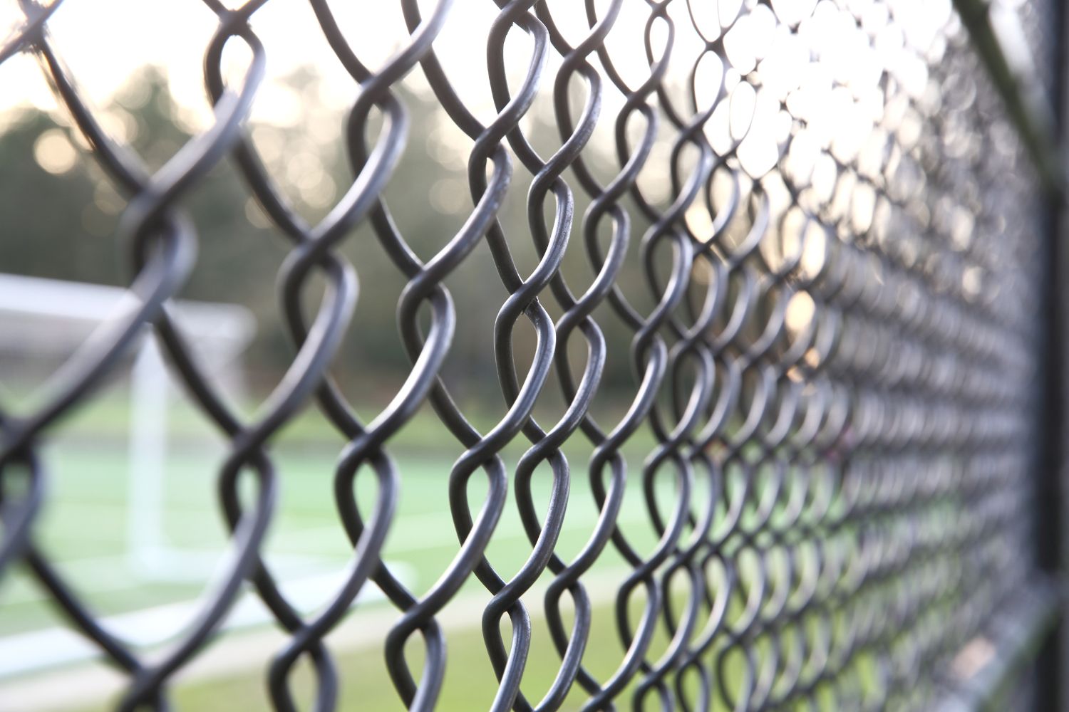 Places where it is common to find chain link fences